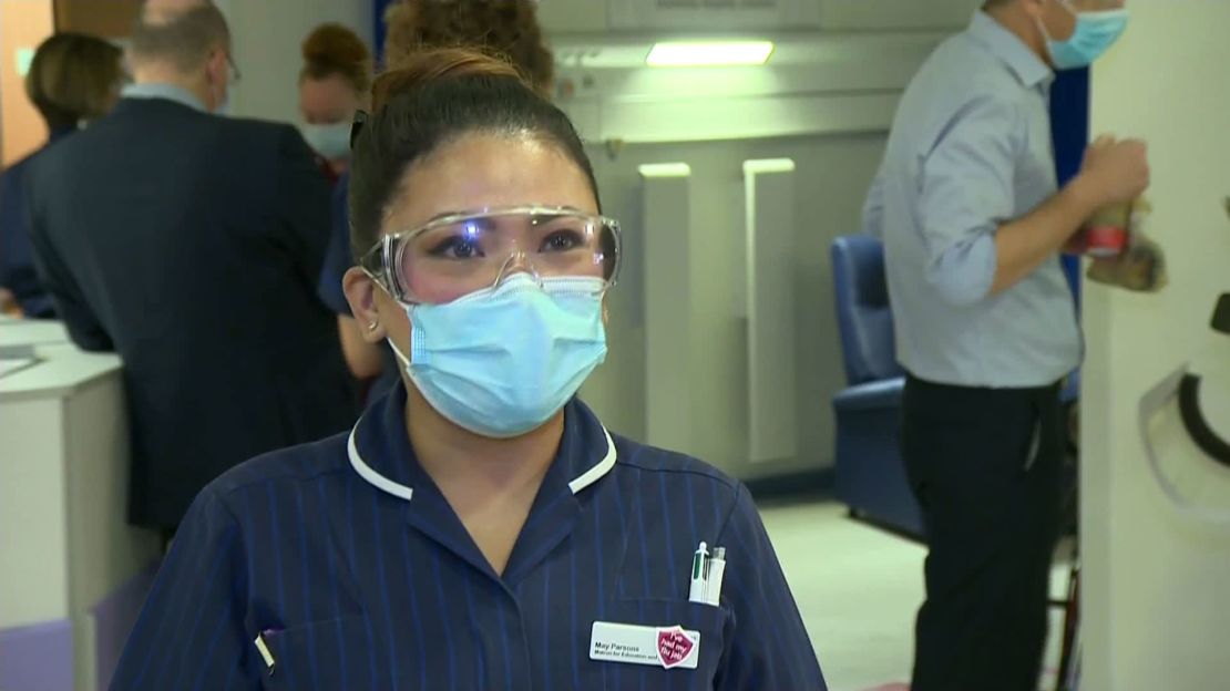 May Parsons, a nurse originally from the Philippines who has worked for the UK's National Health Service for 24 years, administered the first shot in Coventry.