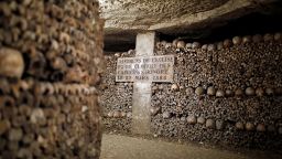 Detail of human skulls and bones which are stacked in the ossuary room in the catacombs of Paris, France, March 29, 2017. REUTERS/Benoit Tessier