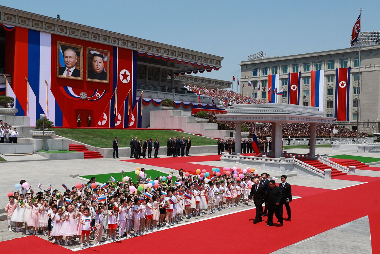 North Korean leader Kim Jong Un, front right, and Russian President Vladimir Putin attend a welcoming ceremony for Putin in Pyongyang, North Korea, on Wednesday, June 19. During Putin’s rare visit to the reclusive state, <a href="https://www.cnn.com/2024/06/19/asia/north-korea-russia-putin-visit-thursday-intl-hnk/index.html">he said Russia and North Korea have ramped up ties to a “new level,”</a> pledging to help each other if either nation is attacked.