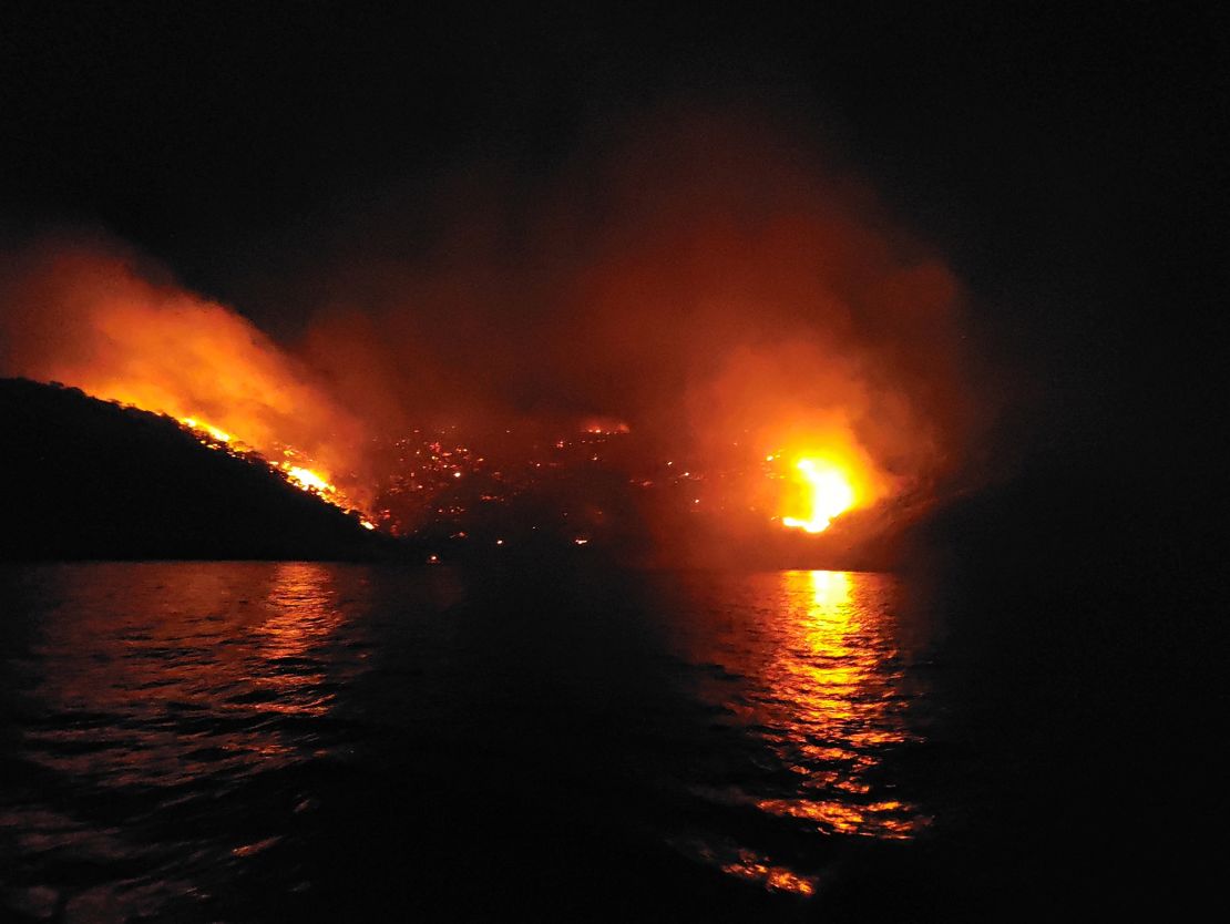 Flames engulf the Greek island of Hydra, on June 21. Wildfires are common on the Mediterranean country, and have become more frequent due to the climate crisis.