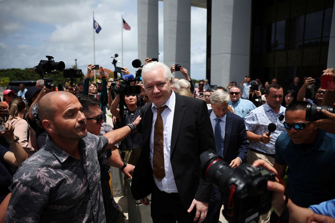 WikiLeaks founder Julian Assange makes his way as he leaves the United States District Court following a hearing, in Saipan, Northern Mariana Islands, on June 26, 2024.