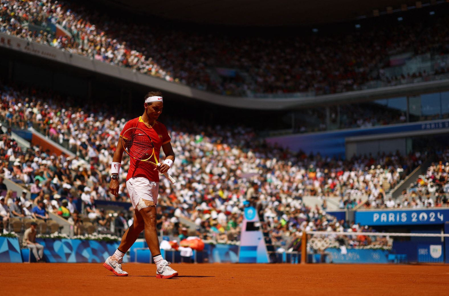 Spain's Rafael Nadal reacts while playing Serbia's Novak Djokovic in a second-round match on July 29. Djokovic defeated his longtime rival in an <a href="https://www.cnn.com/sport/live-news/paris-olympics-news-2024-07-29#h_1ed80ed5abf02b17471e4d6c7a8aec81">epic showdown</a>, winning 6-1, 6-4.