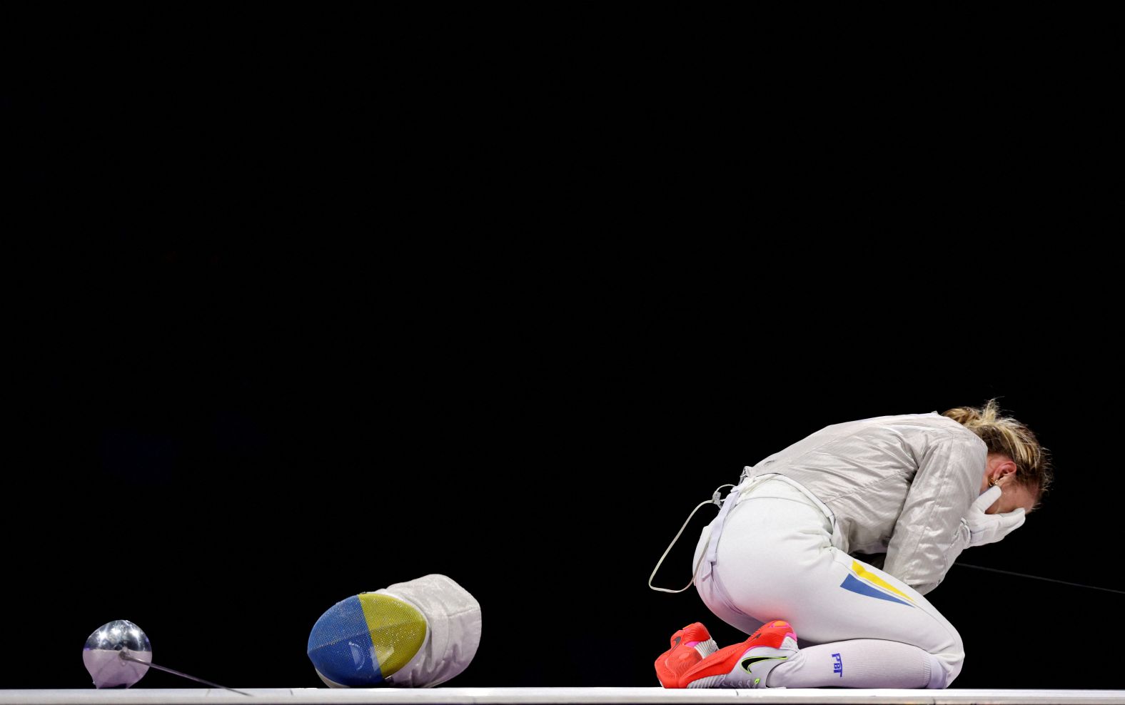 Ukrainian fencer Olga Kharlan reacts after <a href="https://www.cnn.com/sport/live-news/paris-olympics-news-2024-07-29#h_a0a40e162698ac3545ffea8e8d3b2a9a">winning her bronze-medal sabre bout</a> on July 29. It's her country’s first medal of the Paris Olympics.