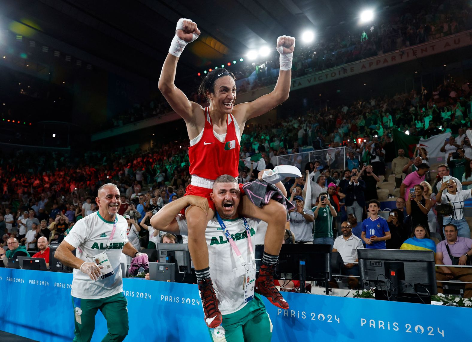 Algerian boxer Imane Khelif celebrates after <a href="https://www.cnn.com/sport/live-news/paris-olympics-news-2024-08-09#h_d73db158fa0a20eff75fd6c7759d6e00">she won gold iin the welterweight division</a> on August 9. During these Games,  Khelif has been <a href="https://www.cnn.com/2024/08/02/sport/who-is-imane-khelif-olympic-boxer-intl/index.html">subject to a torrent of online abuse</a>, with prominent anti-trans figures, right-wing commentators and politicians incorrectly calling her a man — and using the controversy to fuel the wider culture war around gender identity.