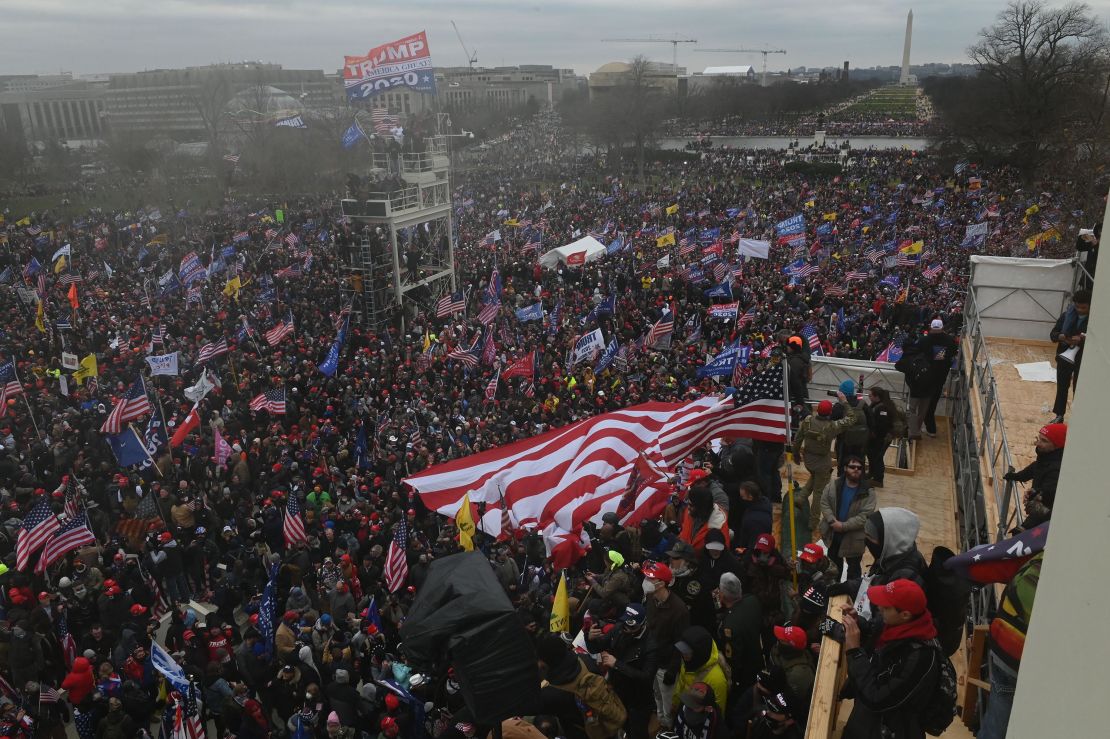 Trump supporters clash with police and security forces as they gather at the US Capitol in Washington, DC on January 6, 2021. 