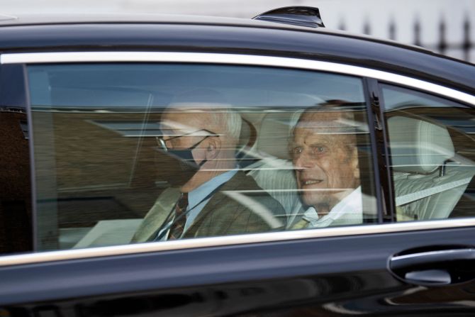 Prince Philip, right, leaves a London hospital in March 2021. <a href="https://www.cnn.com/2021/03/16/uk/prince-philip-leaves-hospital-scli-intl-gbr/index.html" target="_blank">He had a heart procedure</a> a couple of weeks earlier.
