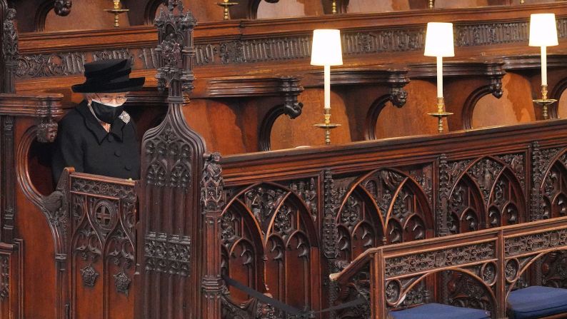 Britain's Queen Elizabeth II takes her seat at the funeral of her husband, Prince Philip, on Saturday, April 17.