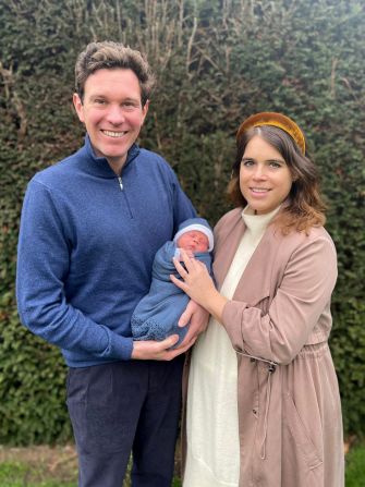 Princess Eugenie and her husband, Jack Brooksbank, hold their newborn son, August, in February 2021. August is 12th in line to the throne, behind his mother, his aunt Princess Beatrice and her daughter, Sienna, and his grandfather, Prince Andrew.