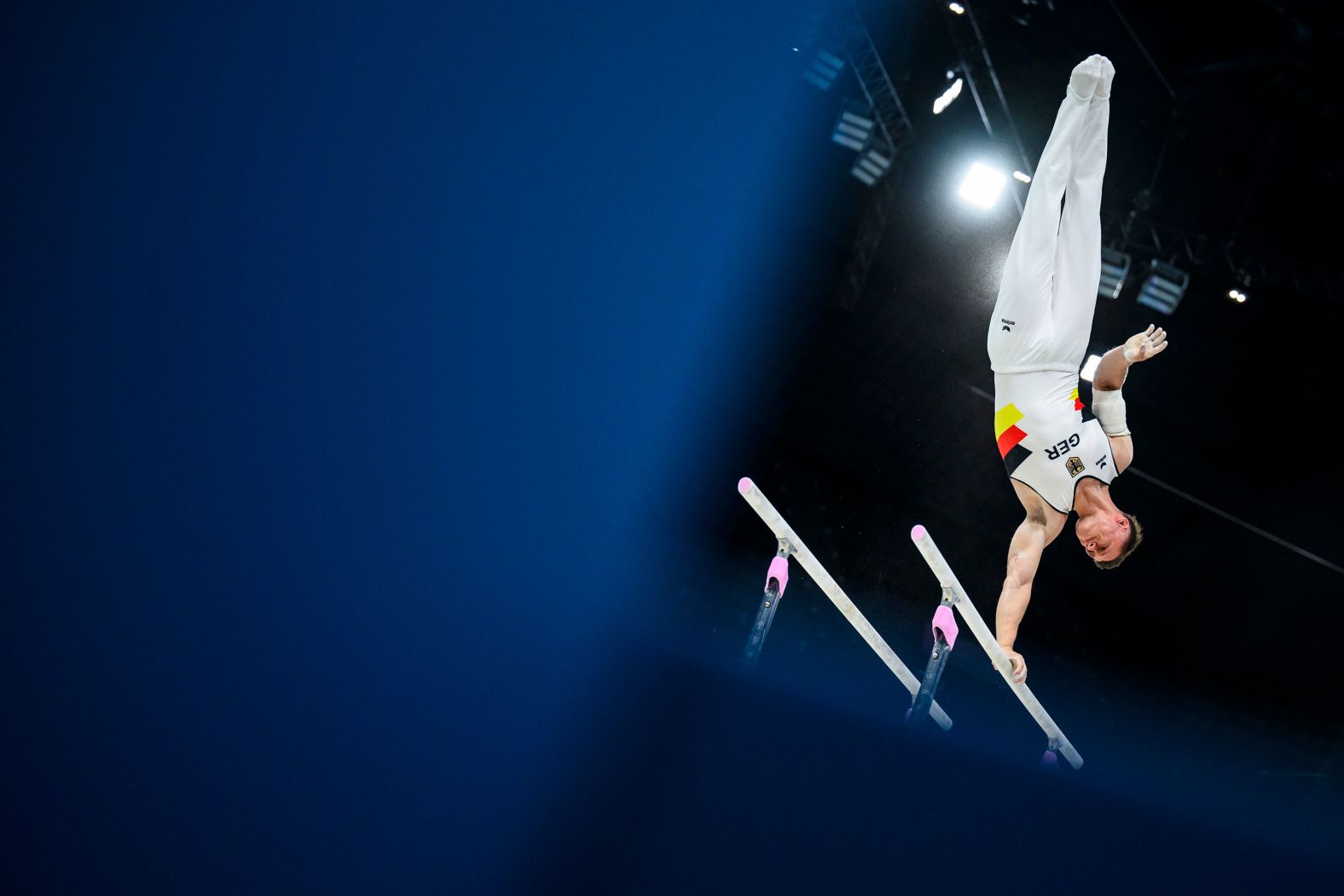 German gymnast Lukas Dauser trains on the parallel bars Wednesday, July 24, as he prepares for Olympic competition in Paris.