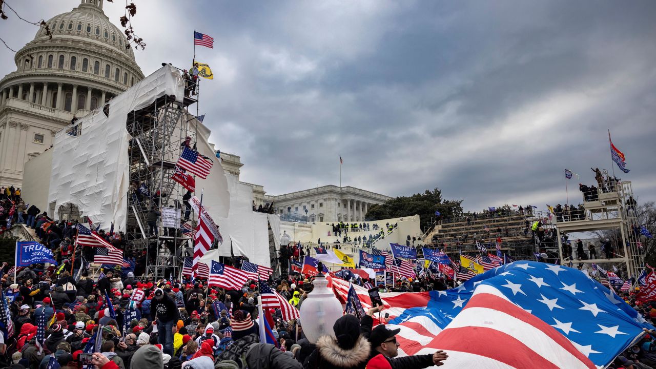 Trump supporters clash with police and security forces as people try to storm the US Capitol on January 6, 2021 in Washington, DC.