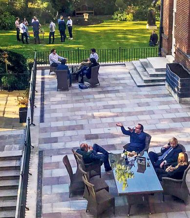 Johnson and staff members are pictured together with wine at a Downing Street garden in May 2020. In January 2022, <a href="https://www.cnn.com/2022/01/12/uk/boris-johnson-pmqs-downing-street-party-intl-gbr/index.html" target="_blank">Johnson apologized</a> for attending the event, which took place when Britons were prohibited from gathering due to strict coronavirus restrictions.