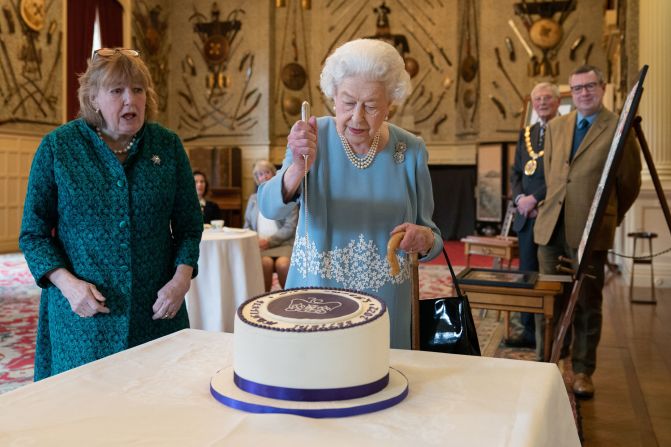 The Queen cuts a cake to celebrate the start of her <a href="https://www.cnn.com/2022/01/09/uk/queen-elizabeth-ii-platinum-jubilee-intl-scli-gbr/index.html" target="_blank">Platinum Jubilee</a> in February 2022. It has been 70 years since <a href="http://www.cnn.com/2022/02/05/europe/gallery/queen-elizabeth-ii-reign-begins/index.html" target="_blank">the Queen took the throne</a> in 1952.