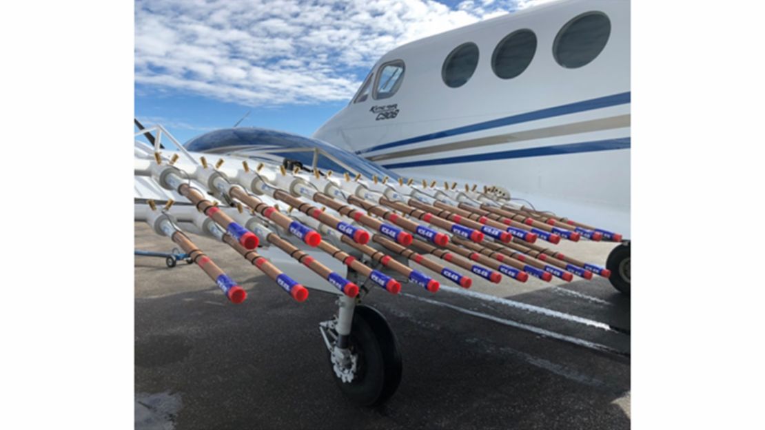 This photo shows flares fixed on the aircraft's wing that house the silver iodide used for cloud seeding.