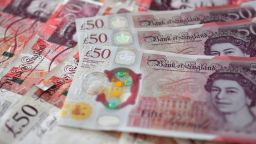 LONDON, ENGLAND - JUNE 28: A photo illustration of British paper £50 banknotes, alongside the polymer replacement, that will soon be taken out of circulation, June 28, 2022 in London, England. The Bank of England will withdraw legal tender status of paper £20 and £50 banknotes after 30 September 2022. The majority of paper £20 and £50 banknotes have been replaced with the recently issued polymer versions, but there are still more than £6bn of paper £20 notes, and more than £8bn of paper £50 banknotes, in circulation. (Photo by Jim Dyson/Getty Images)