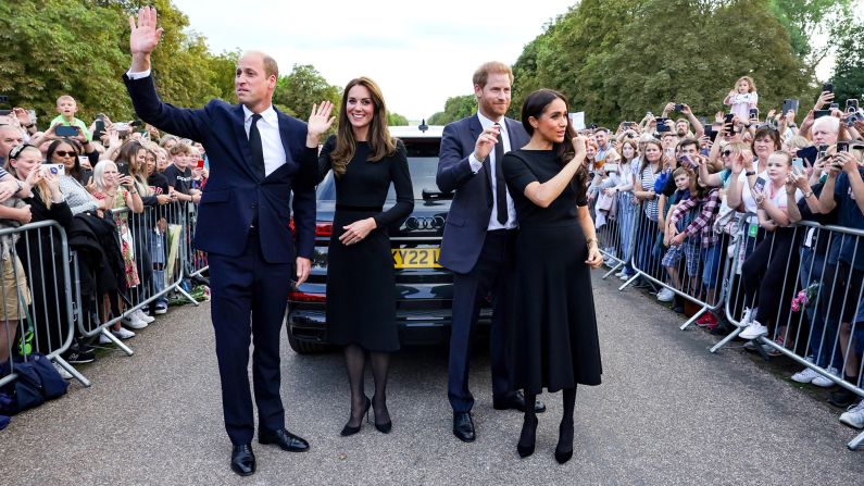 Harry and Meghan are joined by Prince William and Catherine, Princess of Wales, as they greet crowds outside Windsor Castle and view floral tributes to the late Queen Elizabeth II in September 2022. <a href="https://www.cnn.com/2022/09/14/uk/royal-news-newsletter-09-14-22-scli-gbr-cmd-intl/index.html" target="_blank">The appearance</a> was a surprise, not announced in advance. Screams erupted from royal fans as the four emerged, with many hoping the Queen's death would pave the way for a reconciliation between the brothers, whose tension is well-known.