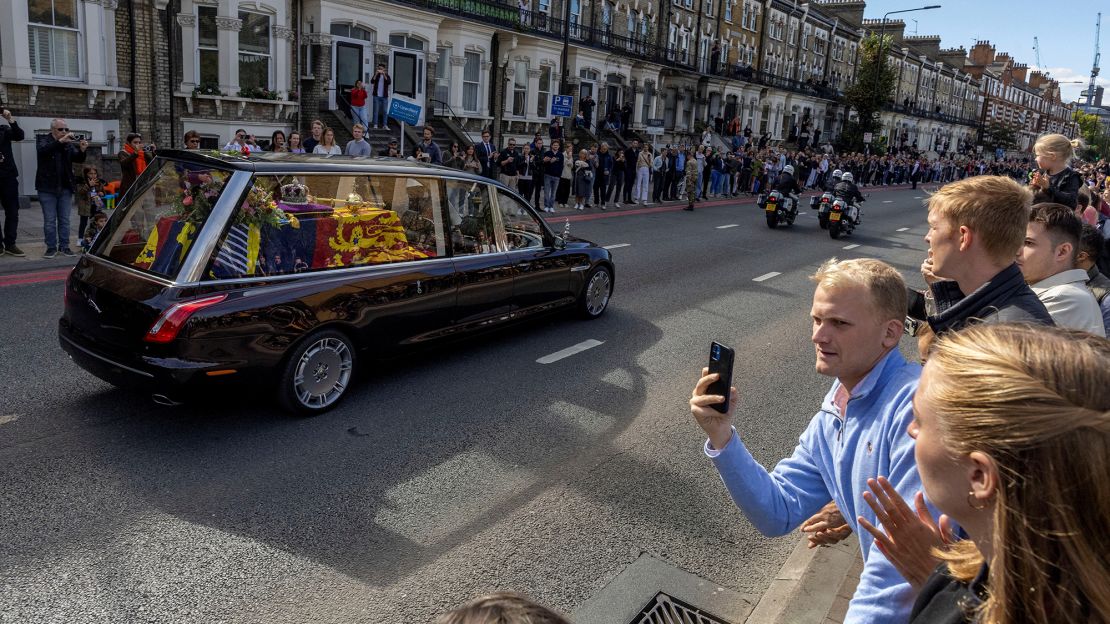 People line the procession route from London to Windsor.