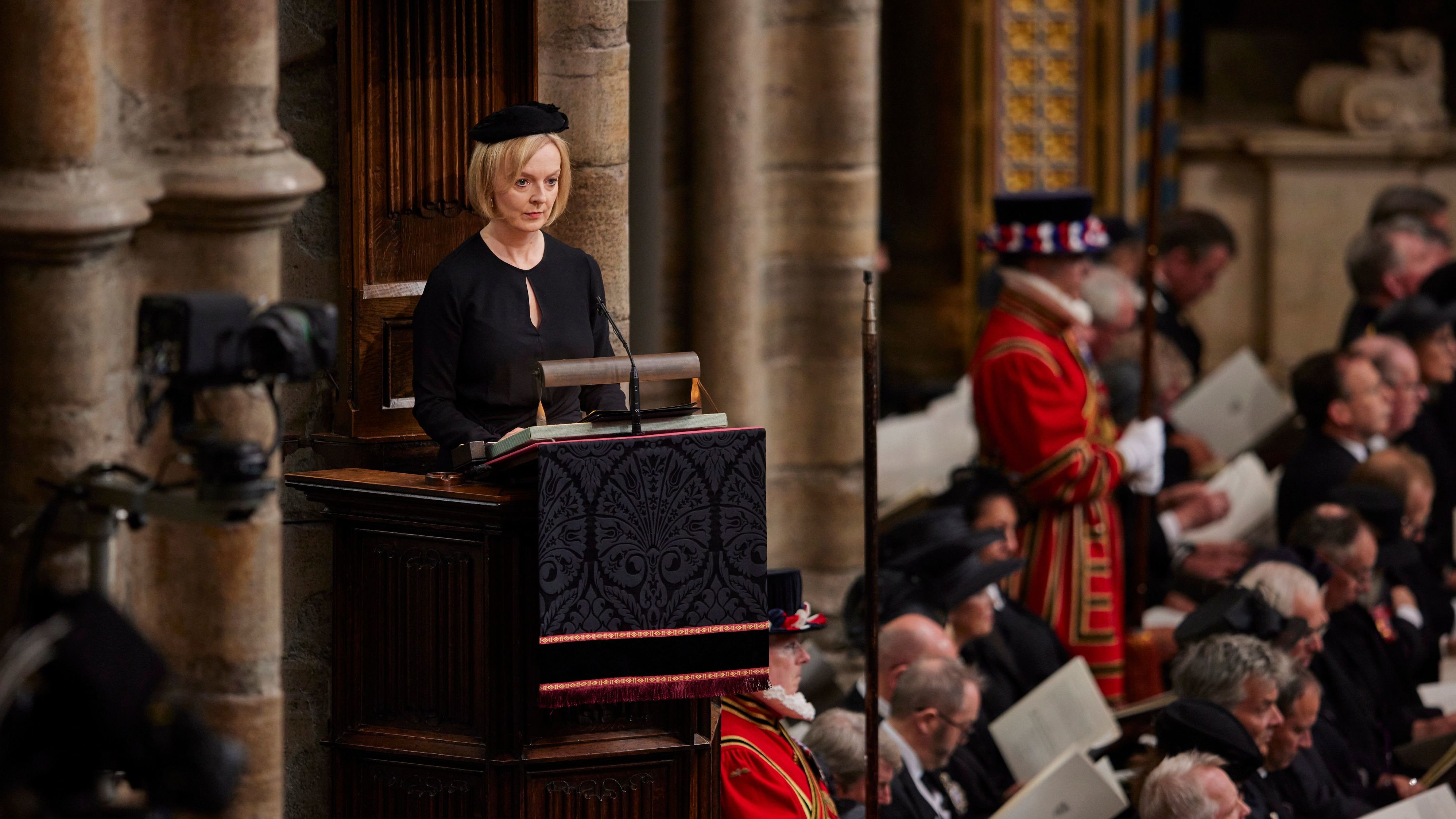 Truss delivers a speech during the funeral service of Queen Elizabeth II at Westminster Abbey in London in September 2022.