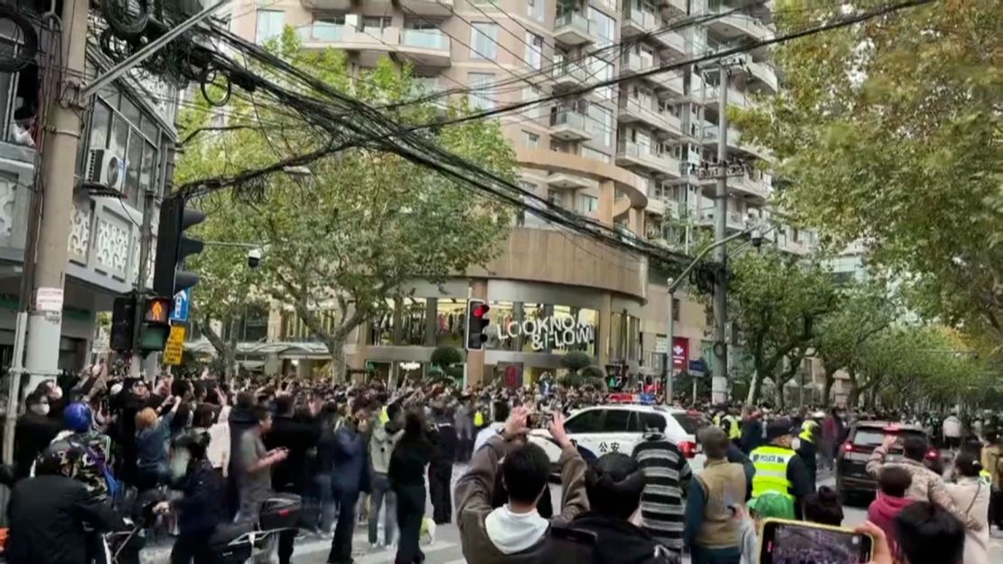 Crowds shouting "Release the people!" in Shanghai.