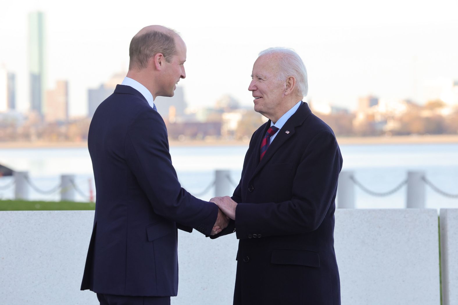 Britain's Prince William shakes hands with US President Joe Biden in Boston on Friday. The two men <a href="https://www.cnn.com/2022/12/02/politics/biden-prince-william-boston/index.html" target="_blank">shared "warm memories" of William's grandmother</a>, the late Queen Elizabeth II, according to Kensington Palace.