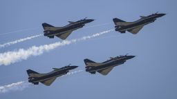 J-10 fighter jets of Chinese air force's August 1 Aerobatic Team perform during the 2022 Airshow on November 10, 2022 in Zhuhai, Guangdong province of China. 