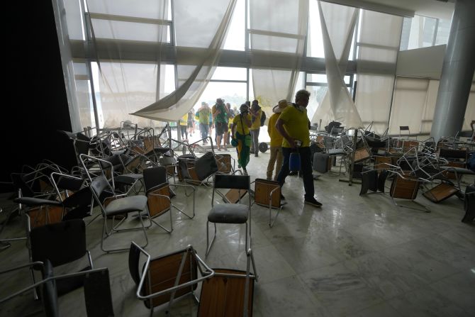 Supporters of former President Jair Bolsonaro storm the the National Congress building in Brasilia.