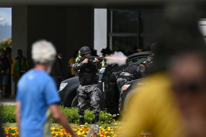 Police confront protesters invading the National Congress in Brasilia.