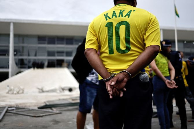 Security forces detain supporters of former President Jair Bolsonaro during a demonstration in Brasilia.