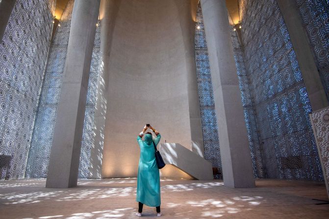 A member of the media visits the interior of the Imam al-Tayeb Mosque during a tour at the Abrahamic Family House in Abu Dhabi on February 21, 2023. - The United Arab Emirates has opened a centre housing a mosque, church and the country's first official synagogue with the aim of promoting interfaith coexistence in the Muslim nation. (Photo by Ryan LIM / AFP) (Photo by RYAN LIM/AFP via Getty Images)