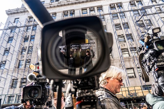 Media and protesters are seen outside Bragg's office in New York on March 20, 2023. A couple of days earlier, Trump said in a social media post <a href="https://www.cnn.com/2023/03/18/politics/donald-trump-manhattan-da-arrest-protests/index.html" target="_blank">that he expected to be arrested within days</a>.