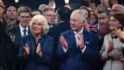 Britain's King Charles III and Britain's Camilla, Queen Consort, applaud an act as thevisit the Reception Schuppen 52 event venue in Hamburg, northern Germany on March 31, 2023. - Britain's Royal Couple is on a three-day tour in Germany for Charles' first state visit as king, with the trip billed as "an important European gesture" to maintain strong ties after Brexit. (Photo by ADRIAN DENNIS / AFP) (Photo by ADRIAN DENNIS/AFP via Getty Images)