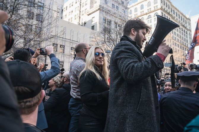 US Rep. Marjorie Taylor Greene <a href="https://www.cnn.com/politics/live-news/trump-new-york-court-arraignment-04-04-23/h_7d63d83b66bd4ea4de8b883de5a5bd39" target="_blank">appears at a rally</a> outside the courthouse on April 4, 2023. When she arrived, Greene told CNN that she was there "to be with the people that have come to peacefully protest." The Republican firebrand from Georgia spoke on a bullhorn for a brief time before departing. 