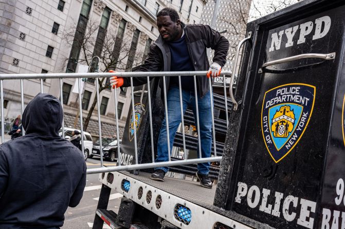 Barricades are dismantled after Trump left the Manhattan Criminal Courthouse on April 4, 2023.