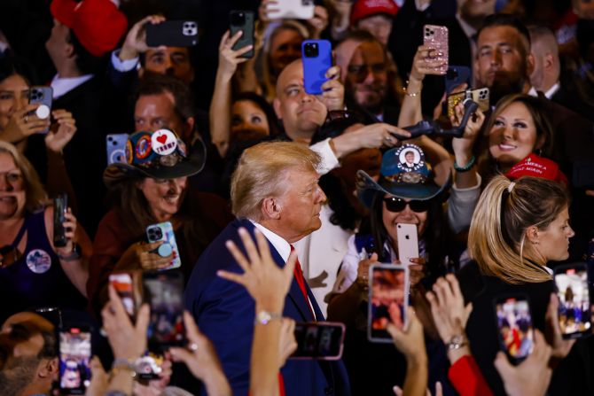 Trump arrives to <a href="https://www.cnn.com/politics/live-news/trump-new-york-court-arraignment-04-04-23/h_e20d168fa6c95c5bdeb928d47879f879" target="_blank">deliver remarks</a> at his Mar-a-Lago resort in Florida on April 4, 2023. "The only crime that I have committed is to fearlessly defend our nation from those who seek to destroy it," he said.