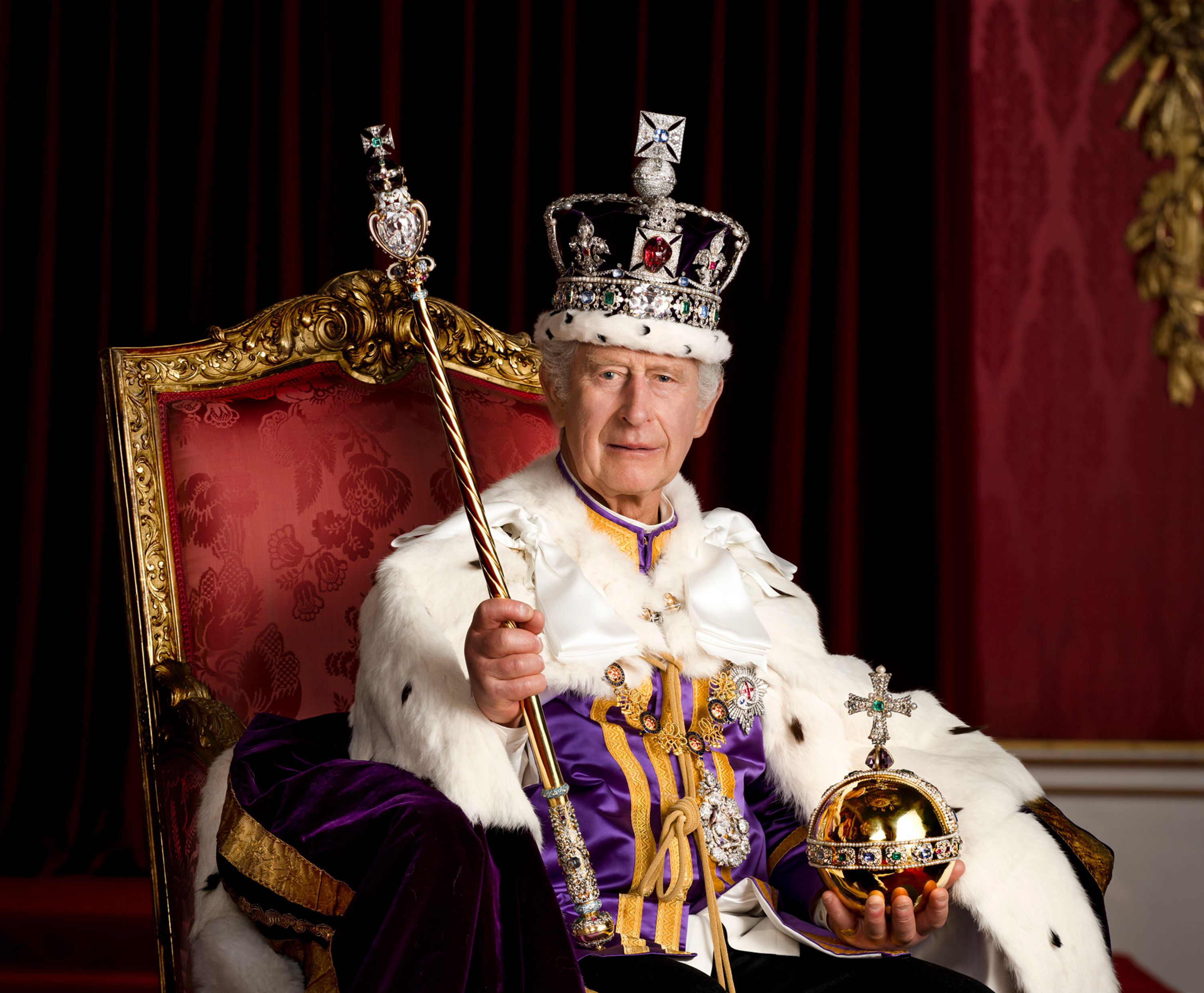 Britain's King Charles III <a href="https://www.cnn.com/2023/05/08/uk/coronation-official-portraits-intl-gbr-ckc/index.html" target="_blank">poses for a portrait</a> in Buckingham Palace's Throne Room after his official coronation in May 2023.