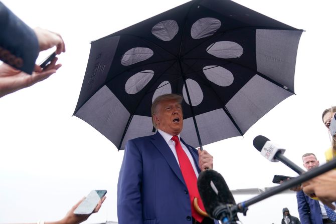 Trump speaks before boarding a plane in Arlington, Virginia, in August 2023. <a href="https://www.cnn.com/2023/08/03/politics/arraignment-trump-election-interference-indictment/index.html" target="_blank">Trump pleaded not guilty</a> to four criminal charges related to his efforts to overturn the 2020 presidential election.