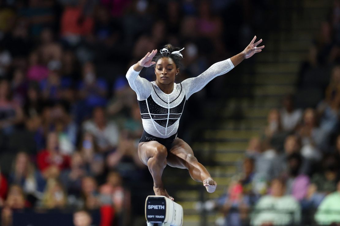 Simone Biles competes on the balance beam.