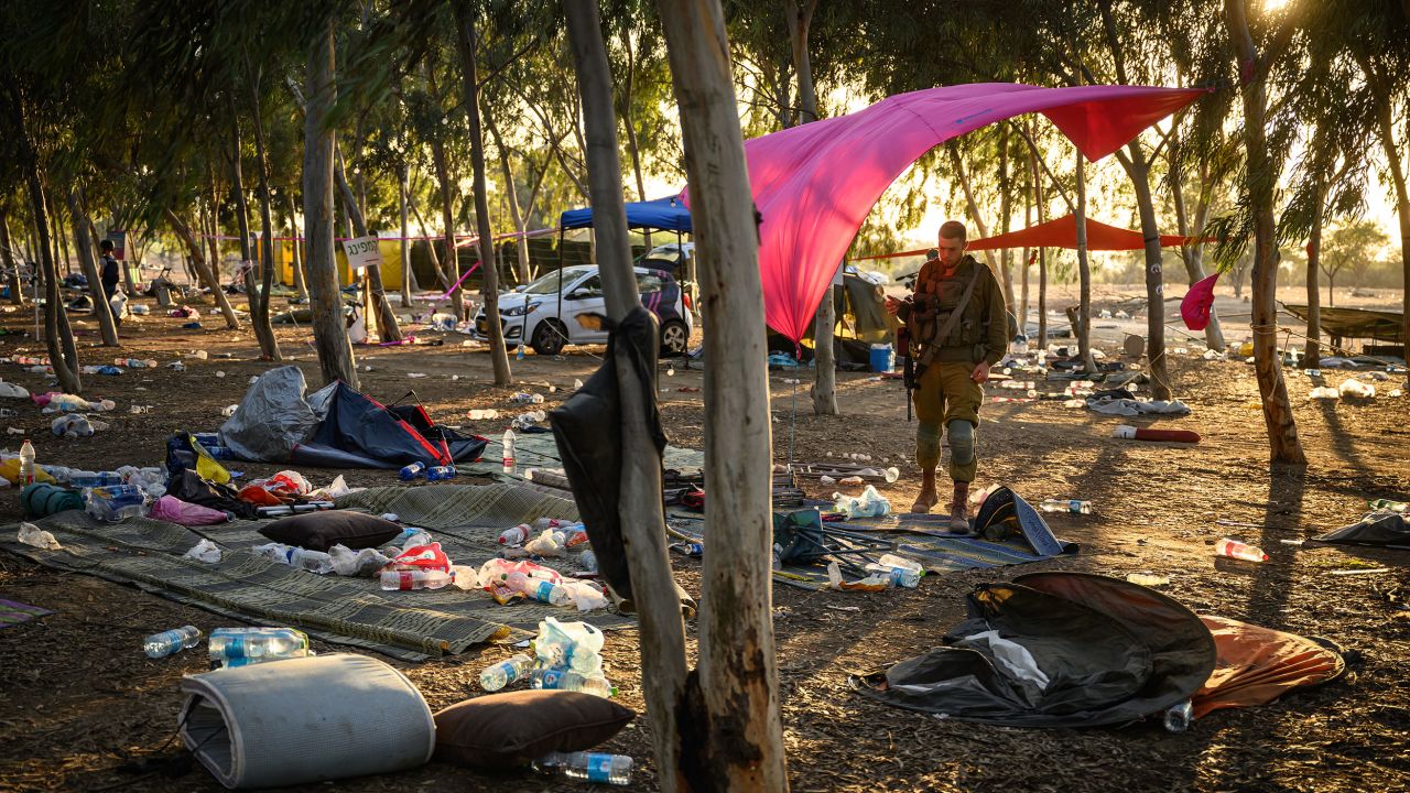 RE'IM, ISRAEL - OCTOBER 12: Members of the security forces continue to search for identification and personal effects at the Supernova Music Festival site, where hundreds were killed and dozens taken by Hamas militants near the border with Gaza, on October 12, 2023 in Kibbutz Re'im, Israel. Israel has sealed off Gaza and launched sustained retaliatory air strikes, which have killed at least 1,200 people with more than 300, 000 displaced, after a large-scale attack by Hamas. On October 7, the Palestinian militant group Hamas launched a surprise attack on Israel from Gaza by land, sea, and air, killing over 1,200 people and wounding around 2800. Israeli soldiers and civilians have also been taken hostage by Hamas and moved into Gaza. The attack prompted a declaration of war by Israeli Prime Minister Benjamin Netanyahu and the announcement of an emergency wartime government. (Photo by Leon Neal/Getty Images)