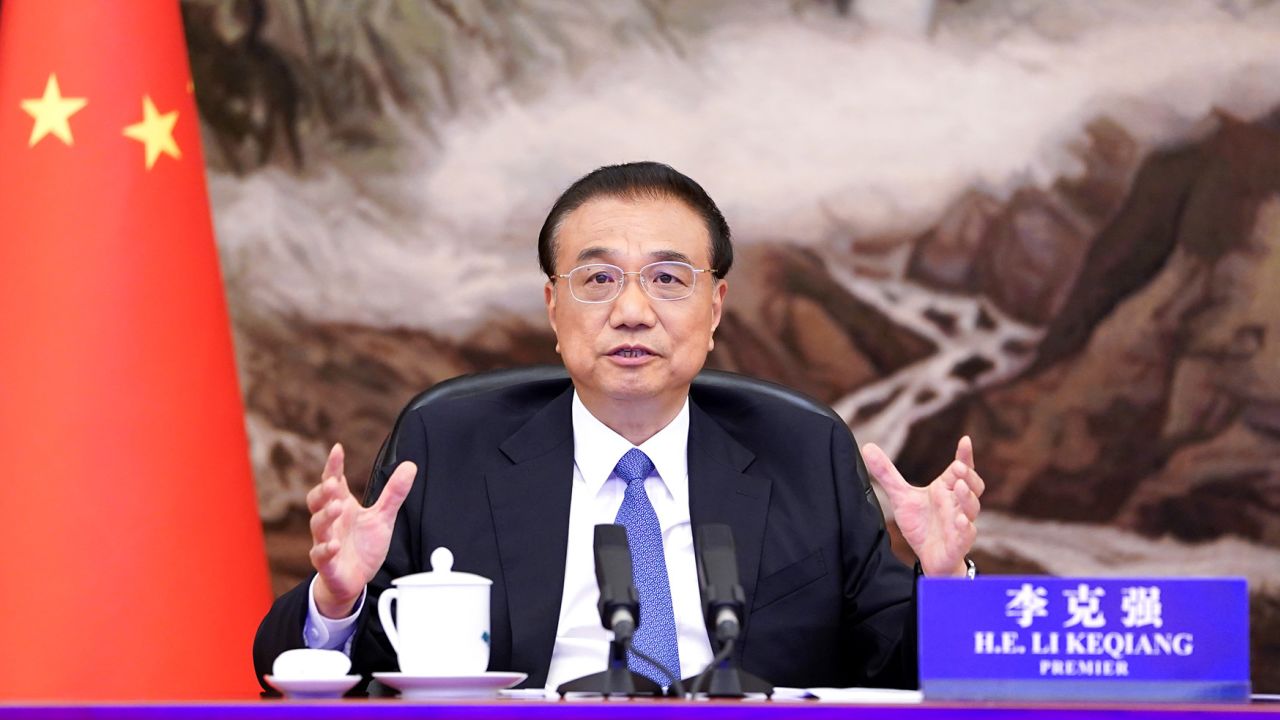 Chinese Premier Li Keqiang attends the Special Virtual Dialogue with Global Business Leaders hosted by the World Economic Forum, delivers remarks and holds dialogue and exchanges with participating global business leaders at the Great Hall of the People in Beijing, capital of China, July 19, 2022. (Photo by Zhang Ling/Xinhua via Getty Images)