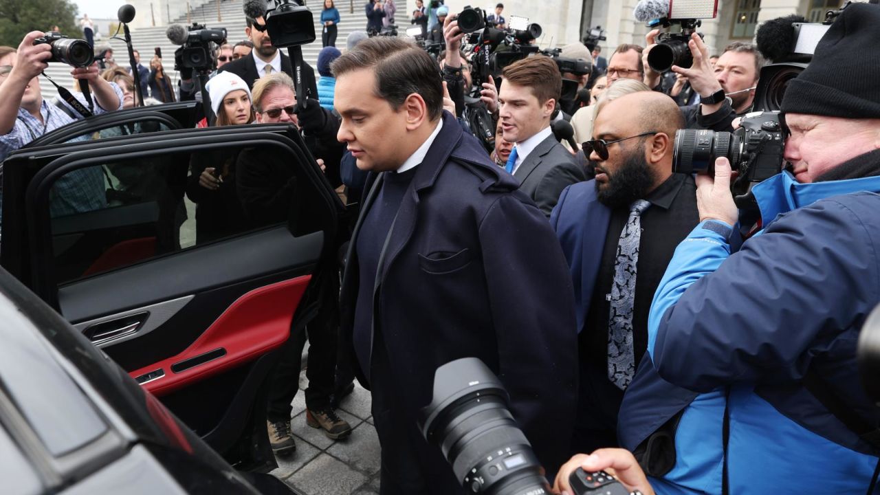 WASHINGTON, DC - DECEMBER 01: Rep. George Santos (R-NY) is surrounded by journalists as he leaves the U.S. Capitol after his fellow members of Congress voted to expel him from the House of Representatives on December 01, 2023 in Washington, DC. Charged by the U.S. Department of Justice with 23 felonies in New York including fraud and campaign finance violations, Santos, 35, was expelled from the House of Representatives by a vote of 311-114. Santos is only the sixth person in U.S. history to be expelled from the House of Representatives. (Photo by Kevin Dietsch/Getty Images)