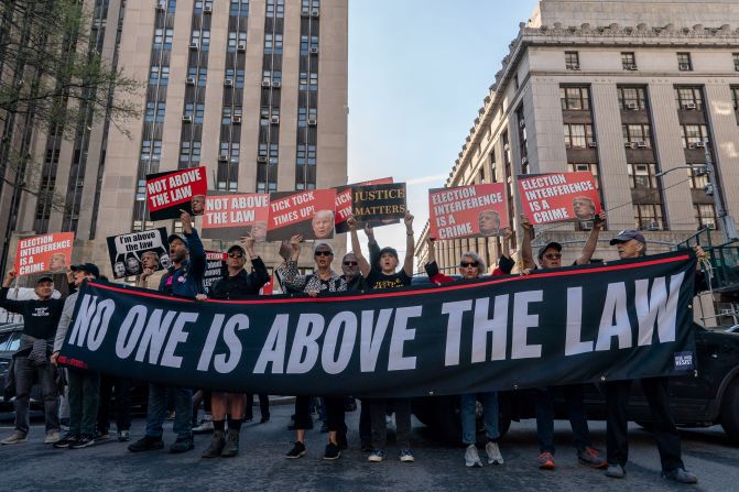 Demonstrators protest outside of the courthouse on April 15.