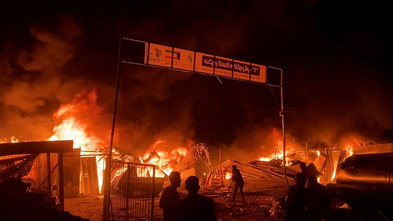 In this video still, fire rages following an Israeli strike on an area designated for displaced Palestinians in Rafah, Gaza, on May 26. Reuters TV/Reuters