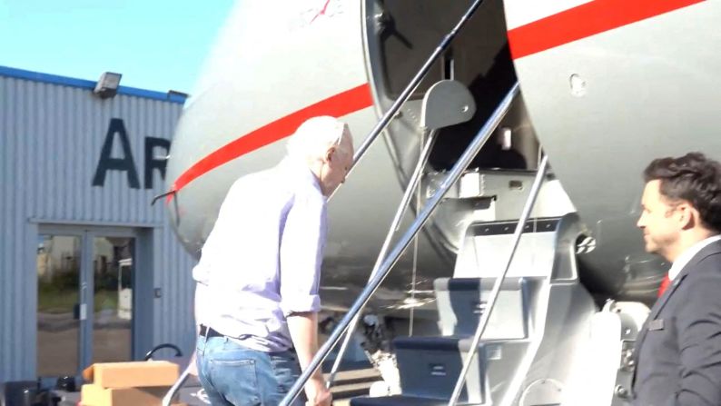 Assange boards a plane at a location given as London, in this still image from video released on June 25 by WikiLeaks via X.