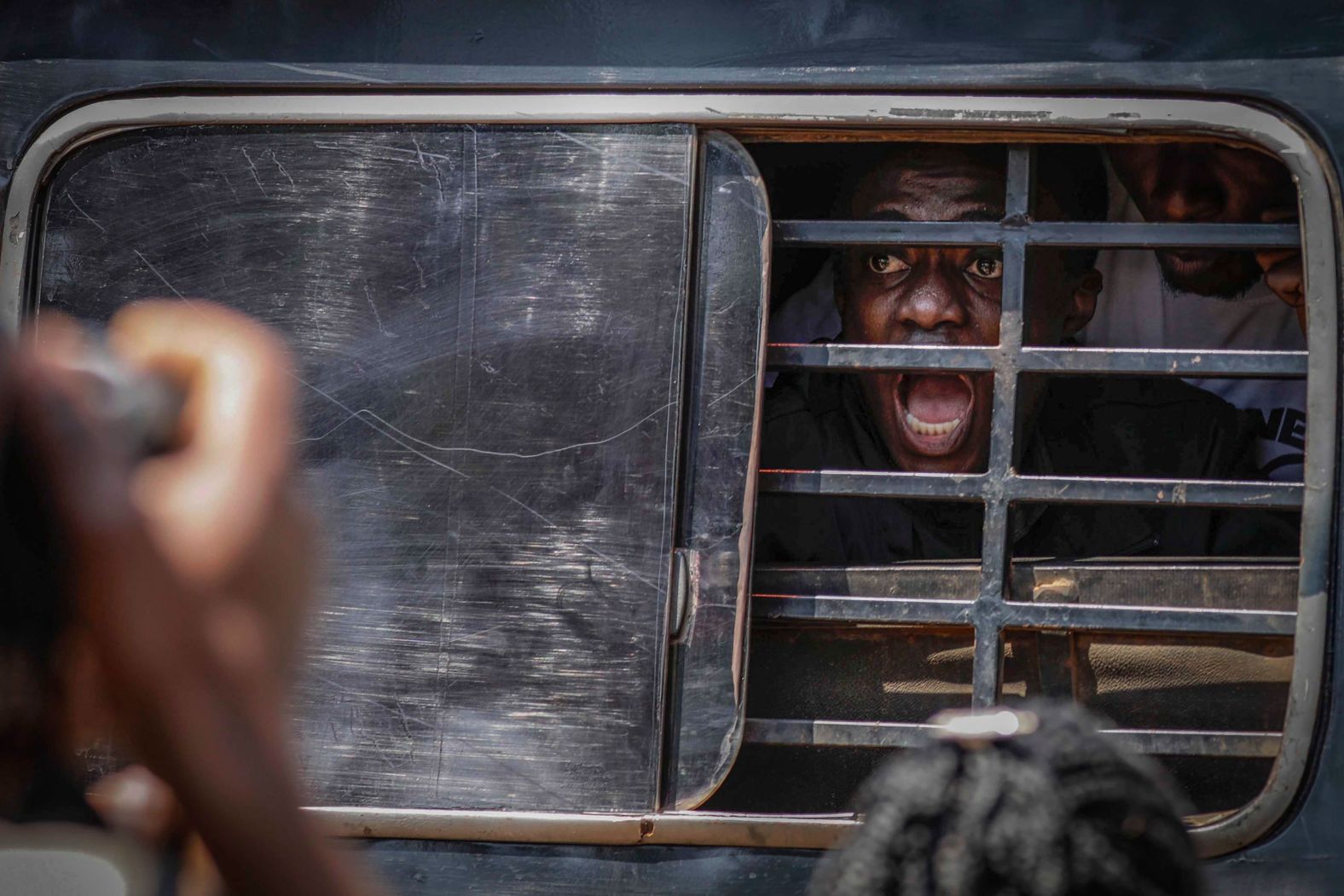 An anti-corruption protester screams as he and others are detained by military police in Kampala, Uganda, on Tuesday, July 23. Ugandan President Yoweri Museveni <a href="https://www.cnn.com/2024/07/22/africa/uganda-anti-corruption-protest-intl/index.html">warned citizens planning to protest</a> that they were “playing with fire.” Museveni, 79, has ruled the East African nation with an iron fist for nearly four decades, and he said in a televised address that the anti-corruption march would not be allowed.