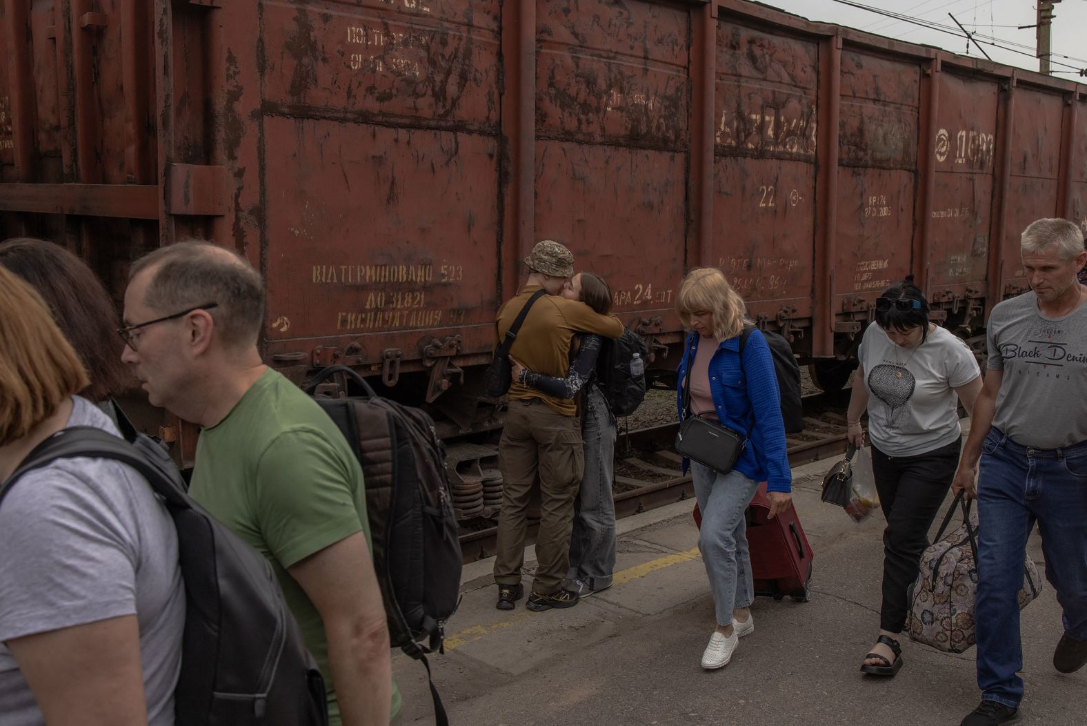 A Ukrainian serviceman kisses his partner after she arrived by train in Kramatorsk, Ukraine, on Saturday, June 15. <a href="https://www.cnn.com/2024/06/13/world/gallery/photos-this-week-june-6-june-13/index.html">See last week in 38 photos</a>.