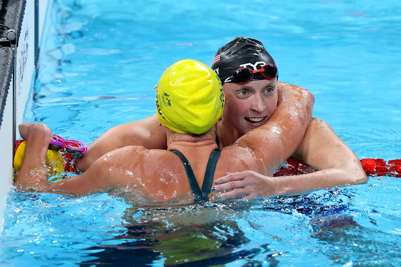 American swimmer Katie Ledecky embraces Australia's Ariarne Titmus after the race.