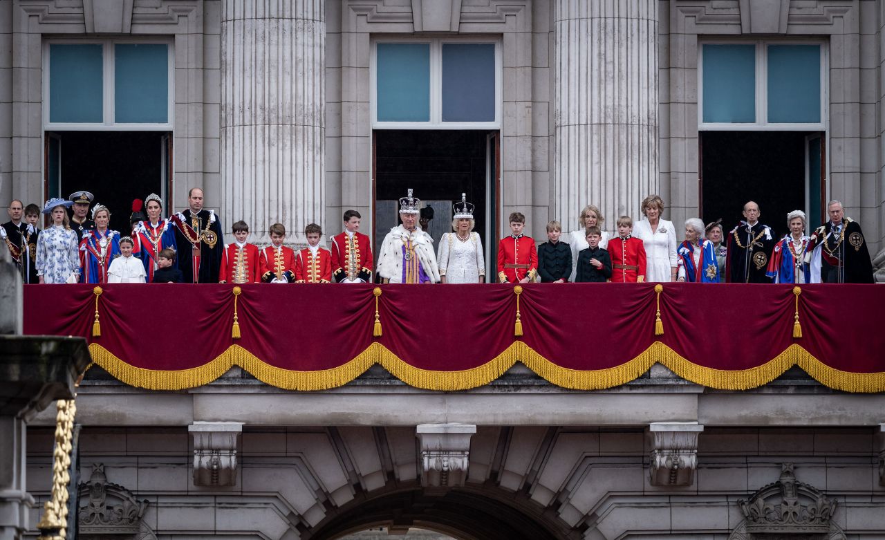 King Charles III stands on the balcony of Buckingham Palace after his coronation.