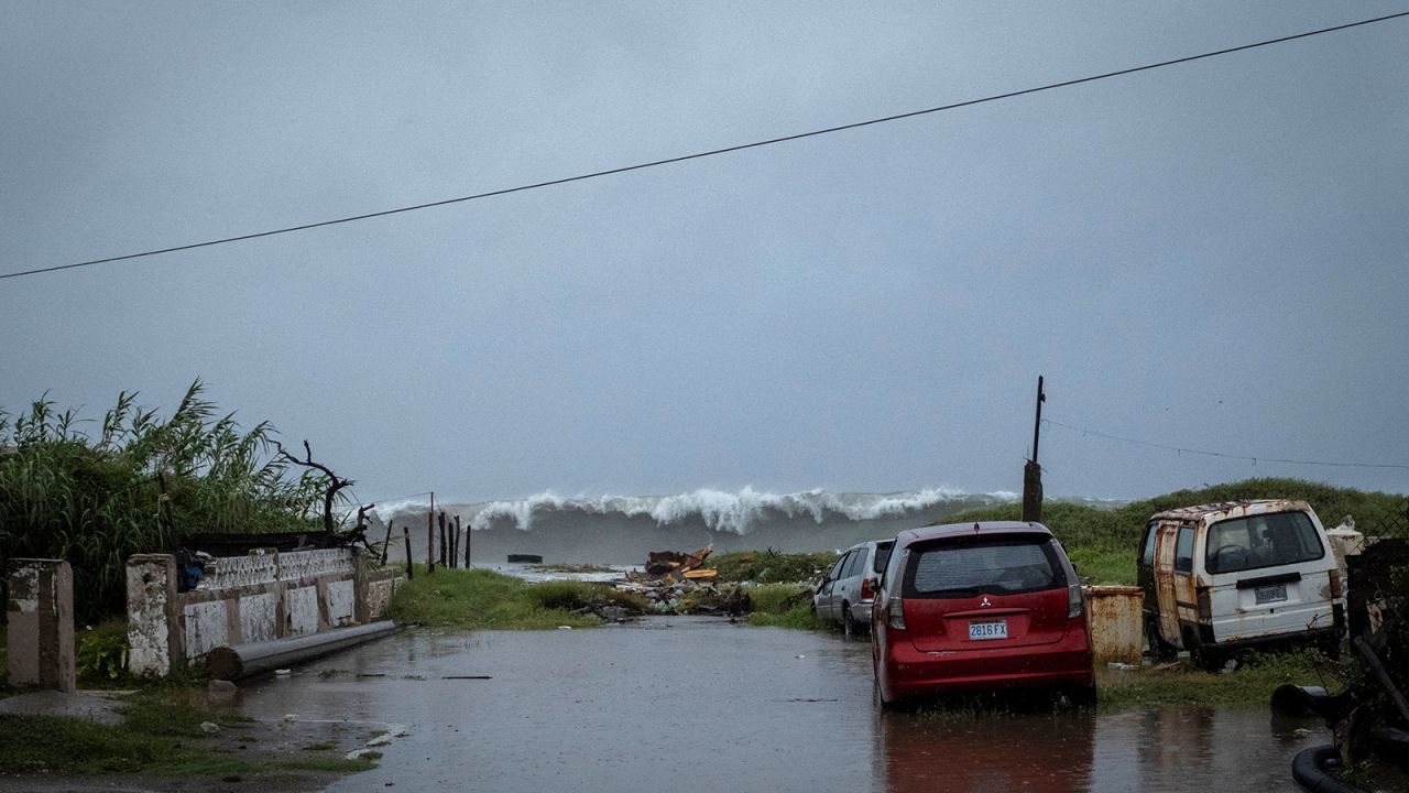 Waves break on shore in Caribbean Terrace neighborhood in Kingston, Jamaica, on Wednesday, July 3.