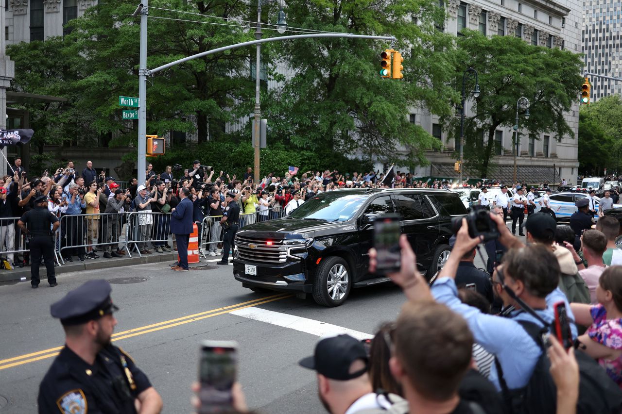 Former US President and Republican presidential candidate Donald Trump leaves Manhattan Criminal Court in his motorcade after he was convicted in his criminal trial in New York City, on May 30.