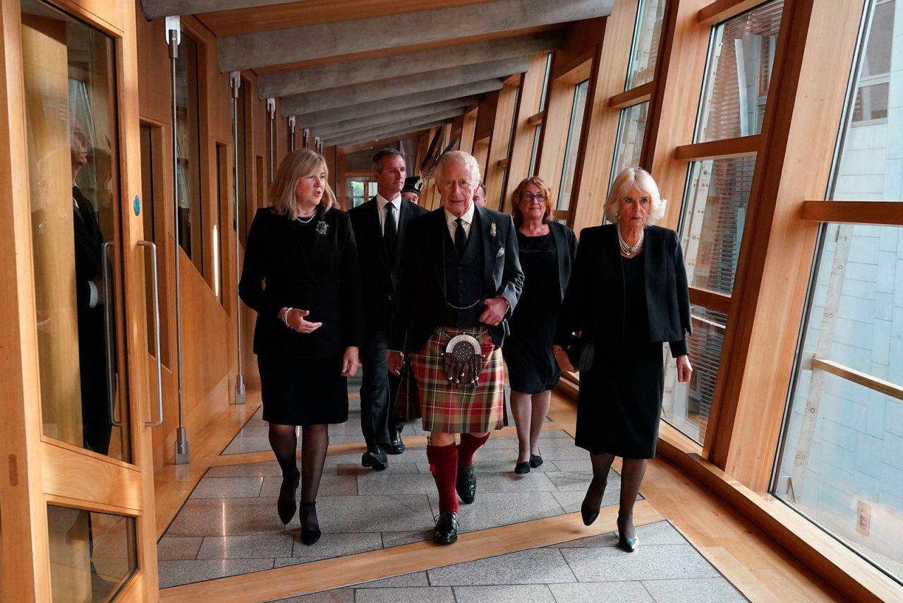 King Charles III and Camilla, the Queen Consort, right, visit the Scottish Parliament on Monday, September 12. 