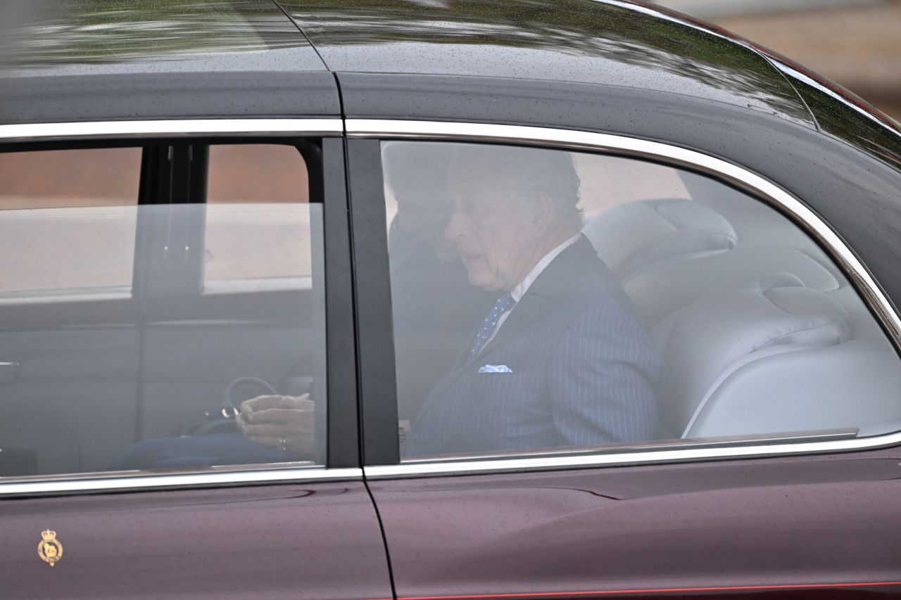 King Charles III arrives at Buckingham Palace ahead of the coronation on Saturday.